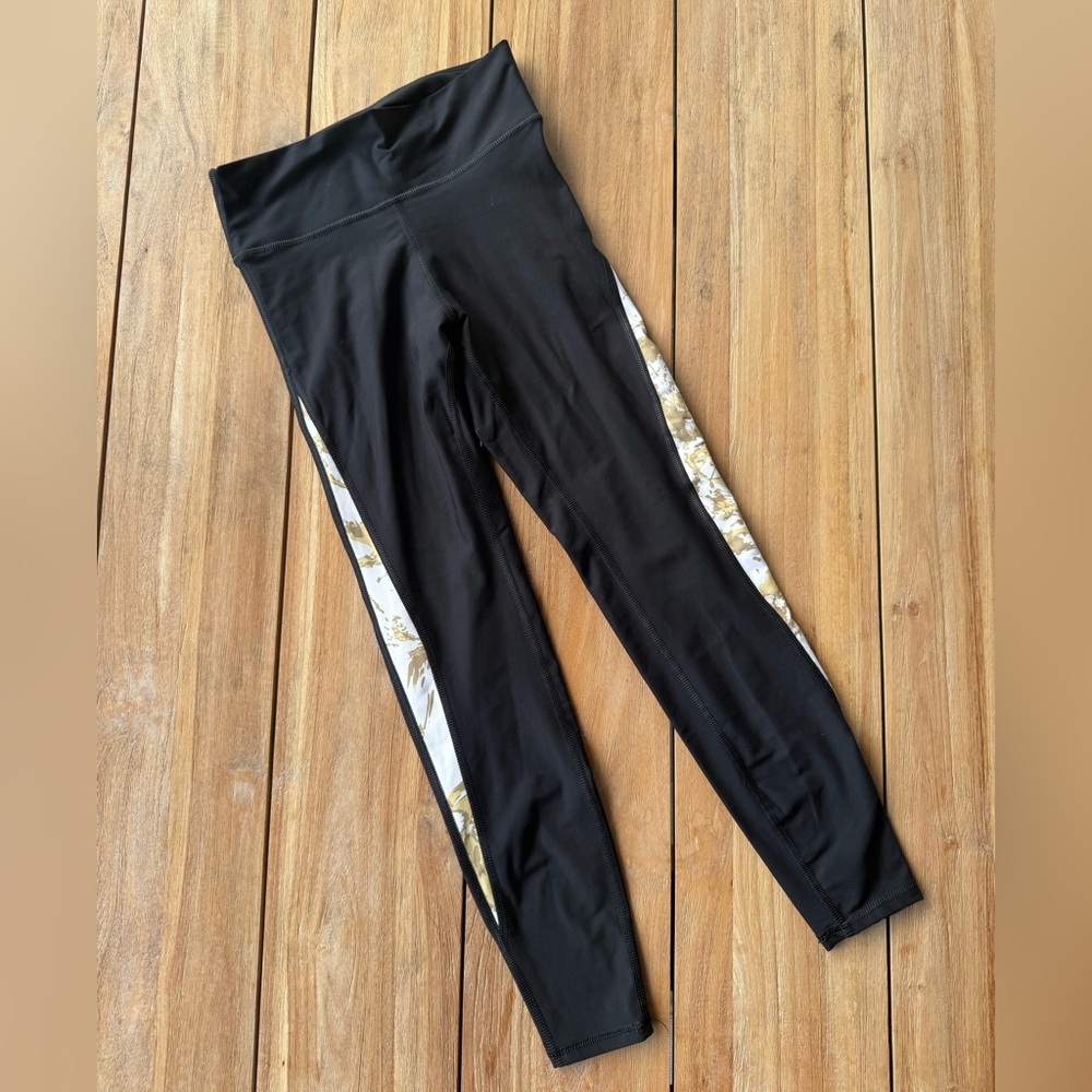 Stylish Black Leggings with Floral Accent
